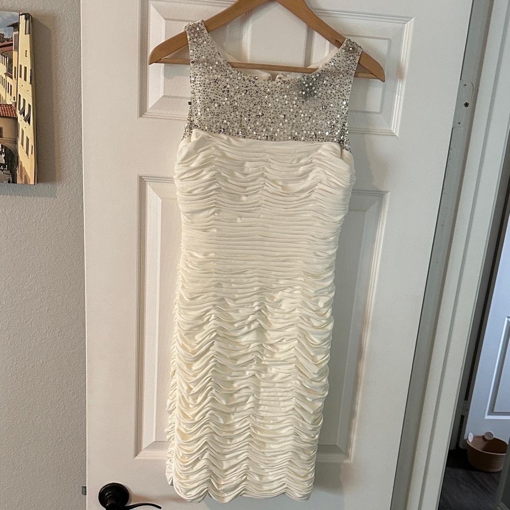 JS Boutique Ivory Sleeveless Dress with Embellished Neckline